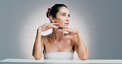 Buy stock photo Thinking, woman and skincare pride in studio for ideas, anti-aging treatment and dermatology. Mature person, planning and facial transformation, natural glow and cosmetic benefits in white background