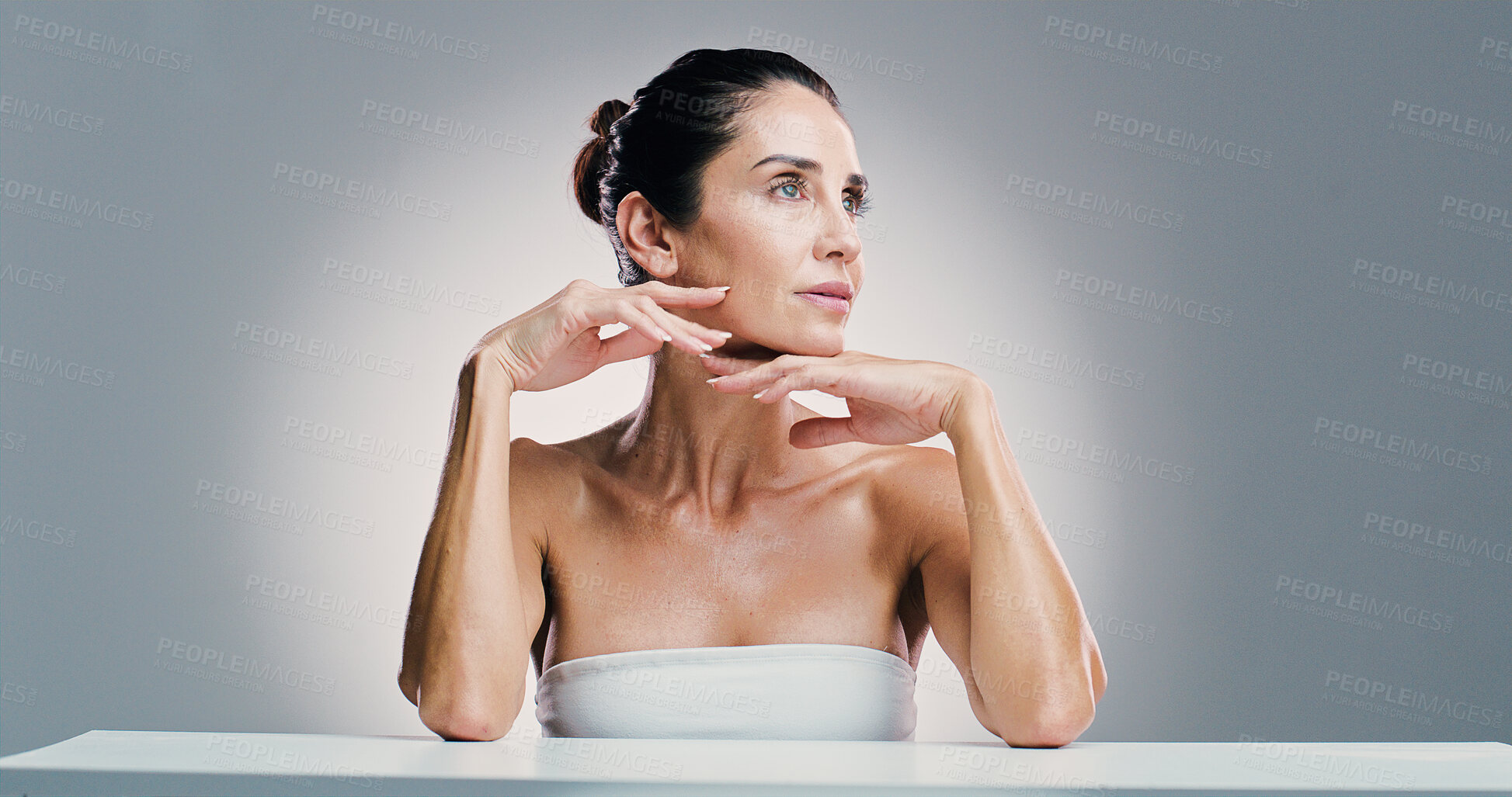 Buy stock photo Thinking, woman and skincare pride in studio for ideas, anti-aging treatment and dermatology. Mature person, planning and facial transformation, natural glow and cosmetic benefits in white background