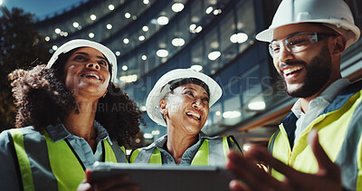 Buy stock photo Night, engineering and people with tablet, funny and conversation with connection. Group, laughing and employees with technology, evening and online planning for construction, humor and discussion