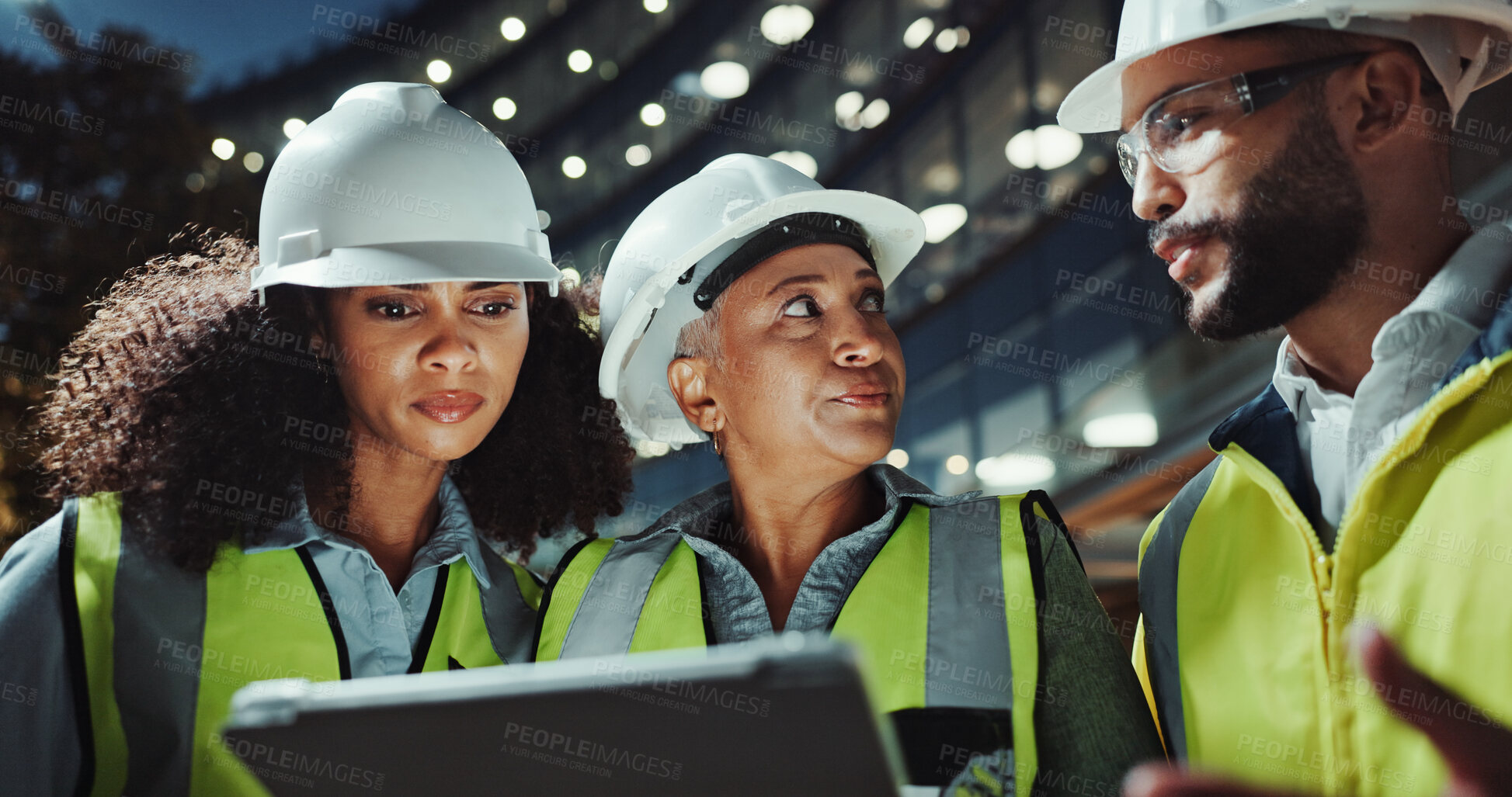Buy stock photo Night, engineering and people with tablet, planning and conversation with digital app for safety policy. Group, manager or employees with tech, evening or idea for construction, below or architecture