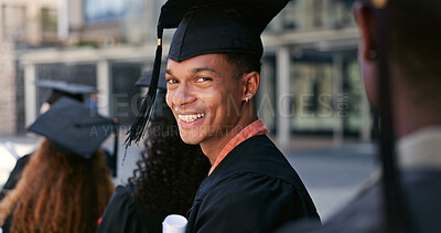 Buy stock photo Graduation, ceremony or portrait of happy man at university for education, opportunity or success. School, scholarship or confident graduate at campus with knowledge, smile and college achievement