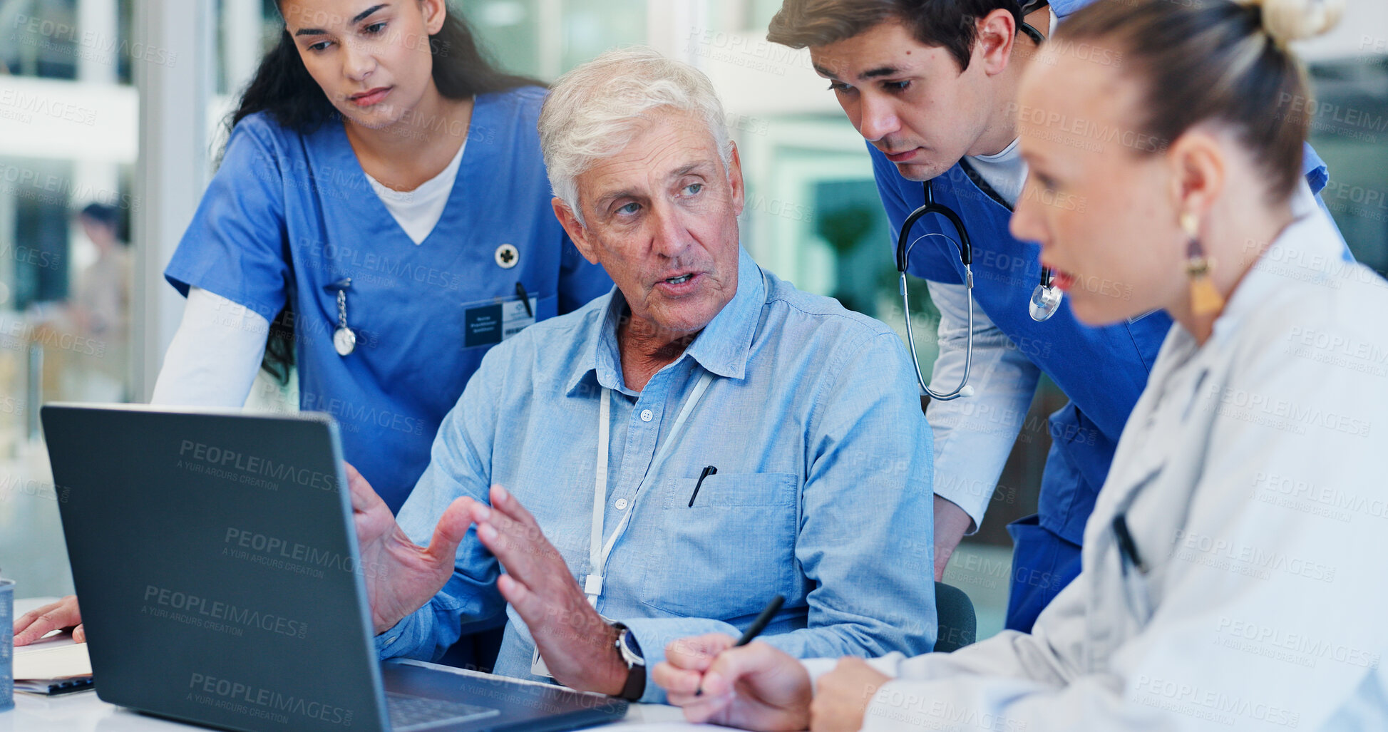 Buy stock photo Man, doctors and laptop with group at hospital with discussion for funding, management and review. People, leader and team with surgeon, problem solving and feedback with computer at wellness clinic