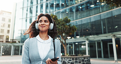 Buy stock photo Commute, music and phone with businesswoman in city for idea, inspiration or travel. Building, headphones and thinking with happy corporate professional outdoor in urban town for start of new job