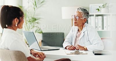 Buy stock photo Appointment, healthcare or laptop with doctor and patient in office of hospital for consulting. Computer, conversation or medical with mature medicine professional and woman in clinic for treatment