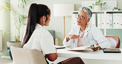 Buy stock photo Appointment, clipboard or medical with doctor and patient in hospital office for consulting. Conversation, documents or healthcare with mature medicine professional and woman in clinic for insurance