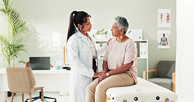 Buy stock photo Consultation, diagnosis and doctor with mature woman at hospital or clinic for healthcare. Discussion, exam and patient with medical professional for check up for heart health, advice and care