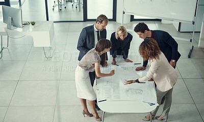 Buy stock photo Blueprint, meeting and architecture with business people in office for idea, property or building proposal. Workshop, floor plan or real estate layout with above of employees for project management