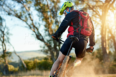 Buy stock photo Man, cycling or dirt road with bicycle for extreme sport, fitness or cardio workout in nature. Active, cyclist or riding with mountain bike, helmet or backpack for adrenaline rush or outdoor exercise