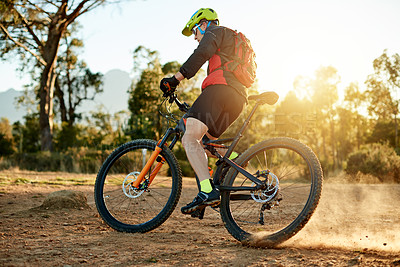 Buy stock photo Nature, man and athlete cycling with sports race, workout or cardio exercise on dirt road. Fitness, mountain bike and male cyclist riding on dust trail for competition training with adventure.