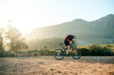 Buy stock photo Cycling, off road and space with man in mountains for outdoor exercise, fitness or hobby. Bike, scenic trail and speed with cyclist person in nature for challenge, performance or sports training