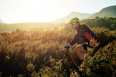 Buy stock photo Cycling, man and mountain bike in nature for fitness, health and exercise on journey at sunset. Countryside, rider and bicycle for sports, off road adventure and travel for workout or cardio training