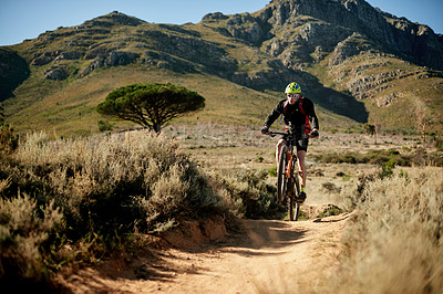 Buy stock photo Mountain bike, dirt road and man with fitness, energy and hobby with adventure. Healthy person, extreme sports and cyclist with practice, travel or wellness with journey, challenge or competition