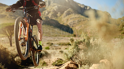 Buy stock photo Cycling, off road and ramp with person in mountains for outdoor exercise, fitness or hobby. Bike, jump and trail with athlete or cyclist in nature for challenge, performance or sports training