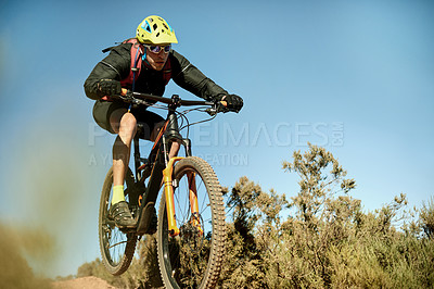 Buy stock photo Mountain bike, adventure and man with bicycle, energy and environment with challenge. Healthy person, extreme sports and cyclist with practice, travel or routine with hobby, wellness or adrenaline