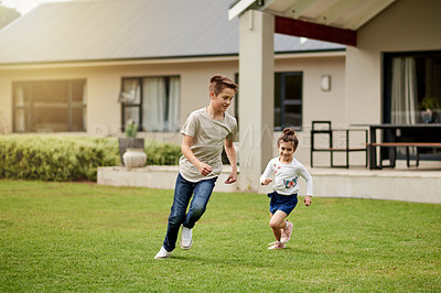 Buy stock photo Children, running and playful game in backyard with energy, fun chase and race for bonding together. Kids, boy and girl with movement for exploring activity, creative adventure and childhood at house