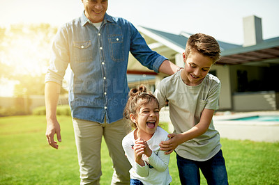 Buy stock photo Outdoor, family and father playing with children in home garden for activity, connection and fun together. Happy, love and dad bonding with kids for game on weekend in backyard of house in summer.