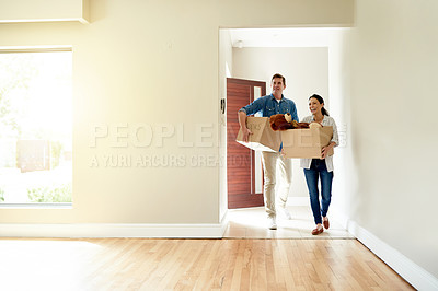 Buy stock photo Boxes, moving and couple in new house for property ownership, relocation and investment. Cardboard, love and people with packages for buying real estate together in marriage for commitment at home.