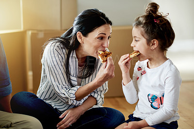 Buy stock photo Moving, mother and child eating pizza in new home to celebrate real estate loan or mortgage on floor. Family, parents and kid with fast food for relocation, unpacking break or share meal in property