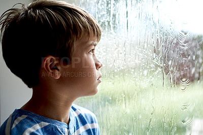 Buy stock photo Depression, boy child and thinking by window with nostalgia, abandoned and unhappy from loneliness. Person, orphan and reflection in home with memory, vulnerable or waiting on adoption at foster care