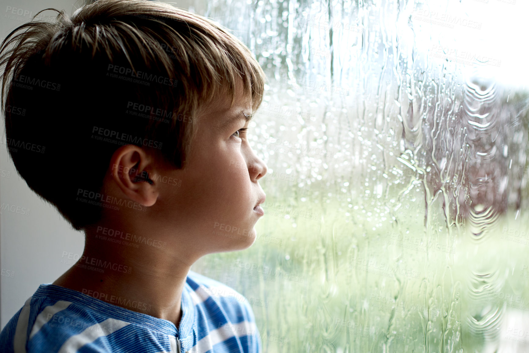 Buy stock photo Depression, boy child and thinking by window with nostalgia, abandoned and unhappy from loneliness. Person, orphan and reflection in home with memory, vulnerable or waiting on adoption at foster care