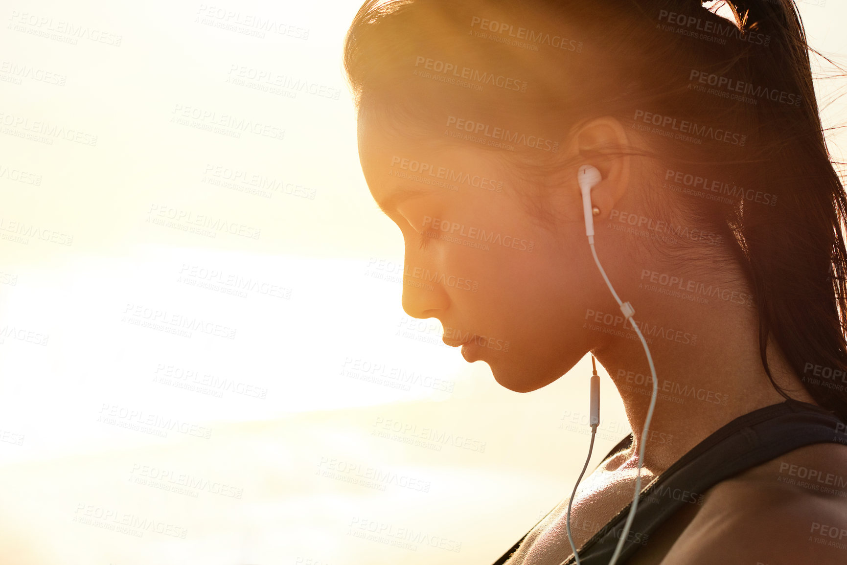 Buy stock photo Fatigue, woman and earphones of fitness outdoor from exercise, listening to music and training recovery. Female athlete, tired and resting with streaming audio, marathon practice and wellness workout