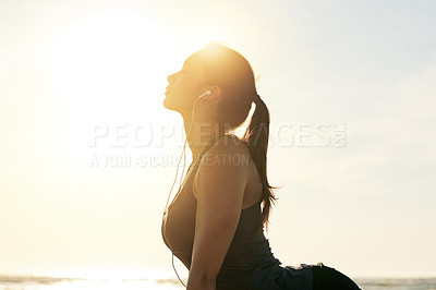 Buy stock photo Meditation, yoga or woman in nature in cobra pose for posture, wellness or holistic health for calm soul. Music earphones, relax or person stretching spine for mindfulness audio or chakra balance