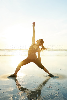 Buy stock photo Beach, yoga and woman in warrior pose for flexibility, wellness or holistic health for calm soul. Relax, body or person stretching arms at sea for mindfulness, chakra balance or peace for awareness