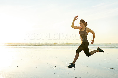 Buy stock photo Fitness, fast and woman running by beach for resistance training, marathon exercise and speed challenge. Space, athlete and sprinting by ocean for competition performance, workout and endurance pace