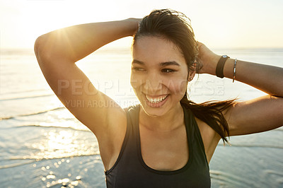 Buy stock photo Stretching, fitness and happy woman at ocean for health, planning workout and relax at sunset. Beach, athlete and confident girl outdoor for training, exercise and thinking of wellness or reflection