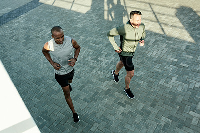 Buy stock photo Friends, above or running for city fitness, exercise or workout wellness in social sports with coach. Men, team or personal trainer for athlete marathon, race or competition training accountability