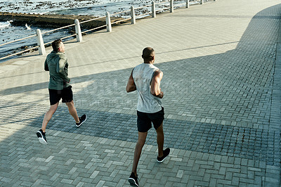 Buy stock photo Men, back or running for beach fitness, exercise or workout wellness with sports coach. Friends, team or personal trainer in athlete marathon, race or competition training accountability on promenade