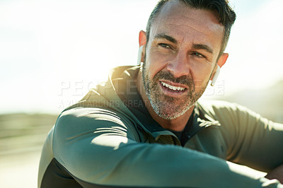 Buy stock photo Happy man, thinking or training break for outdoor running, fitness workout or cardio exercise. Recovery, music playlist or runner with earphones in practice for health, resting or sports performance