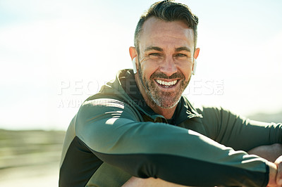 Buy stock photo Mature man, happy and exercise with earphones, portrait and outdoor on break, promenade and fitness. Person, smile and listen to music, streaming and subscription with rest for training in Australia