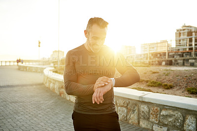 Buy stock photo Outdoor, smart watch and man with fitness, progress and challenge with tracker, sunshine and time. Person, runner and athlete with digital app, training and wellness with monitor and body health