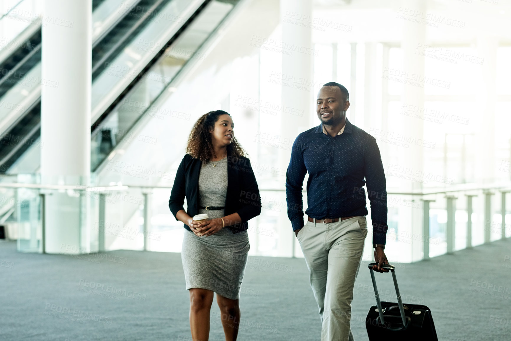 Buy stock photo Business, people and walking with luggage in lobby for international trip, meeting arrival or flight departure. Professional, group and travel in airport for corporate journey and career discussion