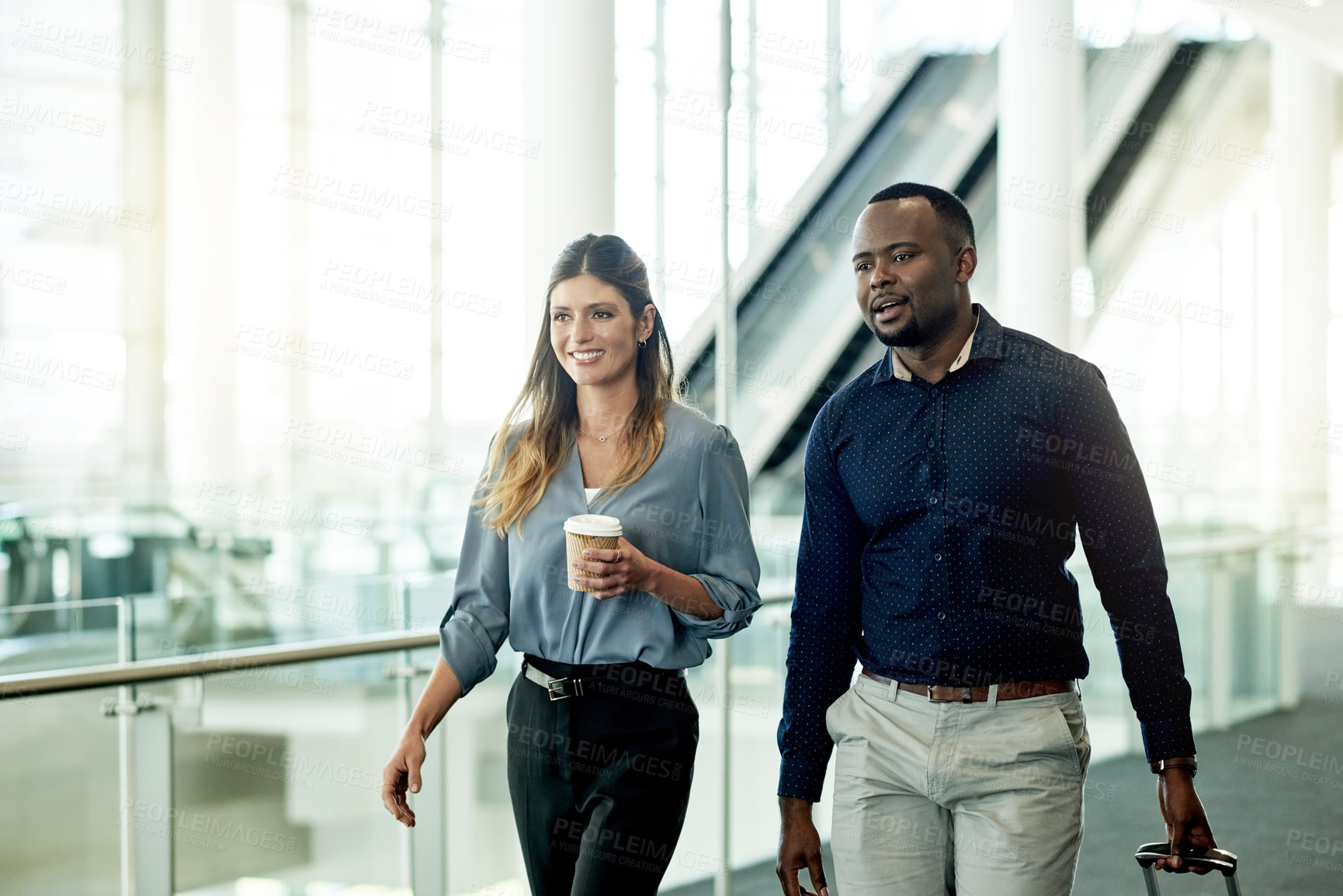 Buy stock photo Business, people and walking together at airport for corporate travel, global convention and international flight. Professional, team or happy in lobby with work arrival, talking or meeting departure