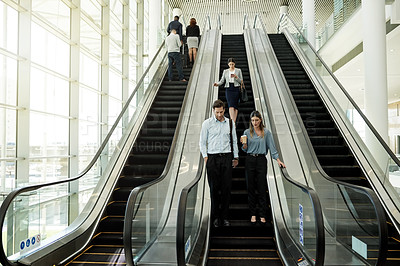 Buy stock photo People, escalator and morning in office building for business, new day or coworkers. Employees, corporate team or stairs in company with meeting schedule, discussion or planning productivity
