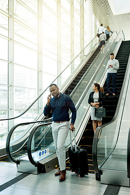 Buy stock photo Man, phone call and luggage at escalator for travel, business contact and booking accommodation. Journalist, suitcase and tech in airport for source lead, information update or planning trip for news