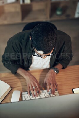 Buy stock photo Computer, typing and web design with man in office for coding or programming deadline from above. Business, desktop and engineering with programmer employee in creative workplace for overtime