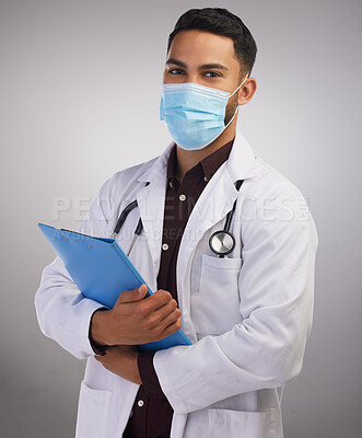 Buy stock photo Studio, portrait and doctor with clipboard, mask and man of science in hospital, healthcare and safety. Document, results and employee in grey background, medical and working for vaccine of covid 19