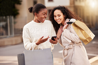 Buy stock photo Smartphone, women and friends with shopping bag for sale, discount or retail together outdoor by mall. People, product or cellphone for ecommerce, online store and deal for fashion or luxury clothes