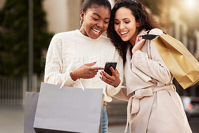 Buy stock photo Smartphone, women and paper bag happy for shopping, sale and retail together outdoor by mall. People, product and cellphone for ecommerce, online deal and promotion for fashion or luxury clothes