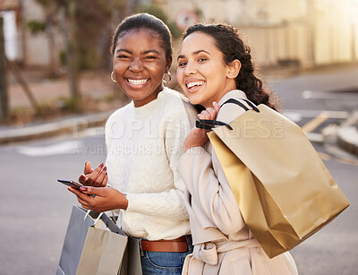 Buy stock photo Smile, women and portrait with smartphone for ecommerce, sale or retail together outdoor by mall. Happy people, paper bag and cellphone for online shopping, discount and deal for fashion or clothes