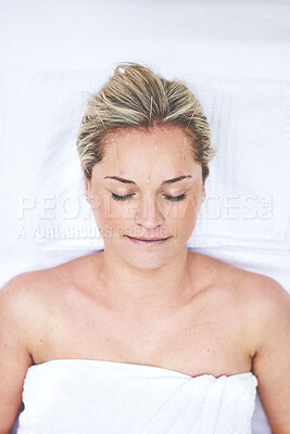 Buy stock photo A young woman getting needles inserted into her head during an acupuncture session. A patient getting alternative therapy for medical treatment