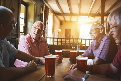 Buy stock photo Group of senior men sitting together in a bar, bonding, senior friends enjoying a day in a pub