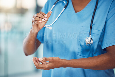 Buy stock photo Hands, healthcare and medicine with a woman nurse in scrubs working in a hospital for health and safety. Trust, care and medical with a female at work in a clinic for wellness, help and insurance 