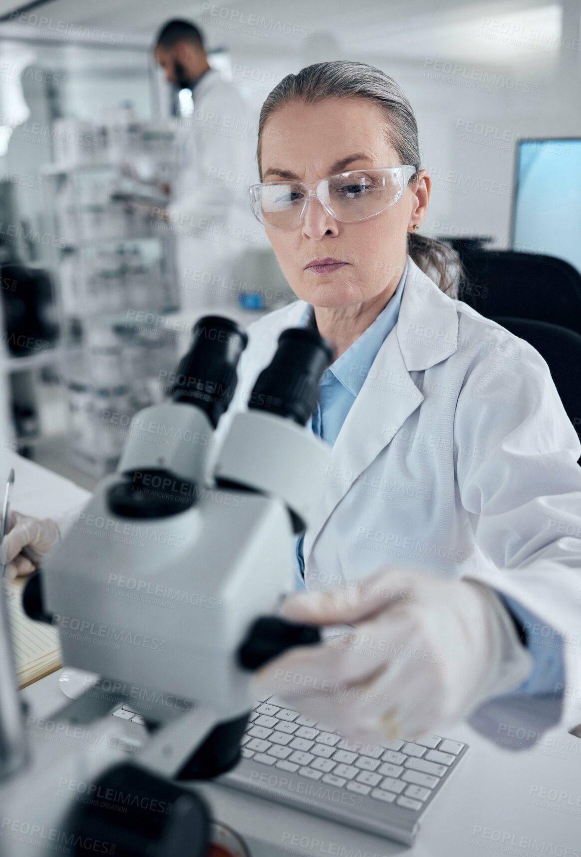 Buy stock photo Science microscope, woman professor and laboratory research, medical innovation or biology test. Senior analytics scientist, chemistry expert and physics worker check focus on dna healthcare analysis