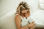 Mother, baby nap and living room in a home with parent care, love and hug on a sofa. Sleeping, mama and newborn child in a family house with mom and young kid together with youth on a lounge couch