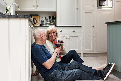 Buy stock photo Senior couple, floor and toast wine for celebration, milestone or anniversary with smile, love and bonding in home. Elderly woman, old man and glass for alcohol, relax and cheers for congratulations