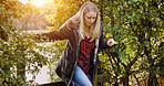 Countryside, morning and woman by fence walking for wellness, fresh air and relax outdoors. Trees, morning and person in field, meadow and farm for calm, peace and freedom in natural environment